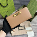 Gucci 750458 Zip wallet with Interlocking G python bow Rose beige - Default Title - View 1