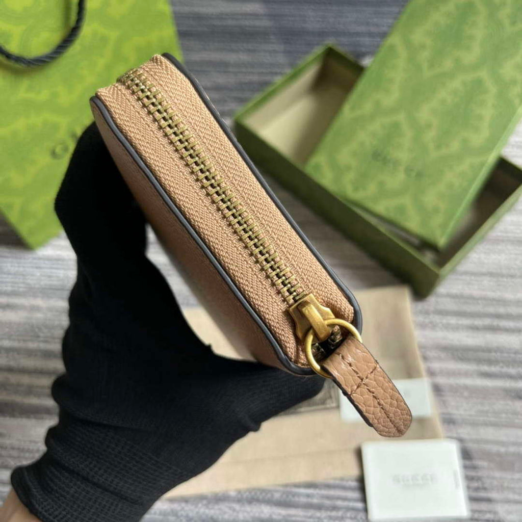 Gucci 750458 Zip wallet with Interlocking G python bow Rose beige