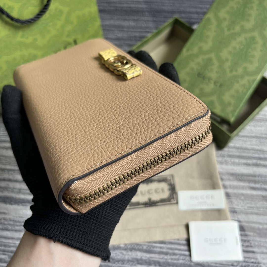 Gucci 750458 Zip wallet with Interlocking G python bow Rose beige