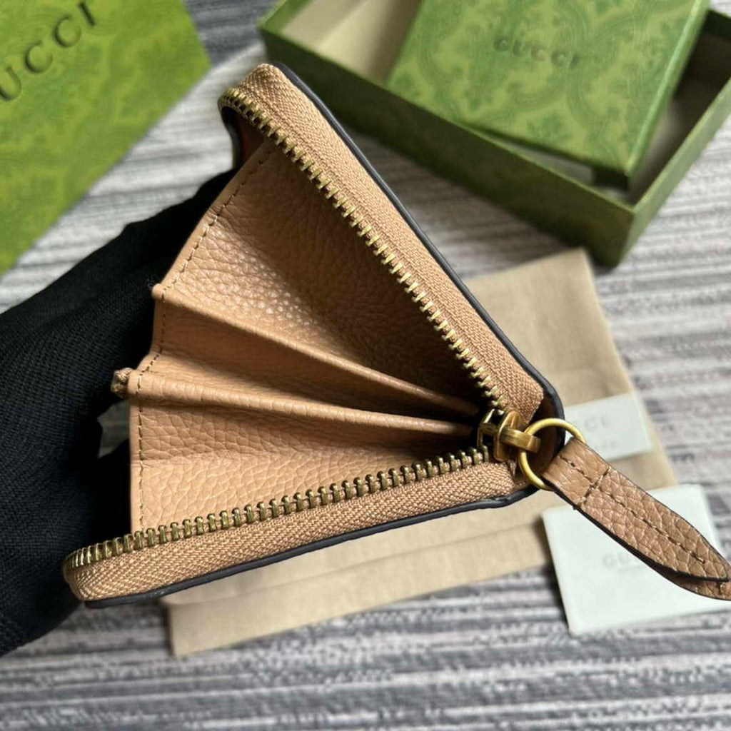 Gucci 750458 Zip wallet with Interlocking G python bow Rose beige
