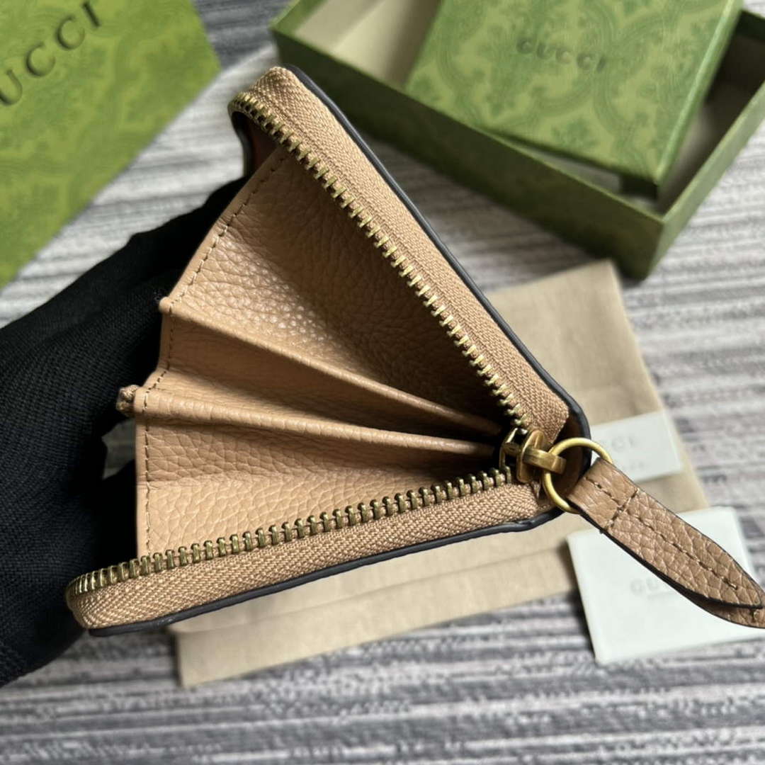 Gucci 750458 Zip wallet with Interlocking G python bow Rose beige