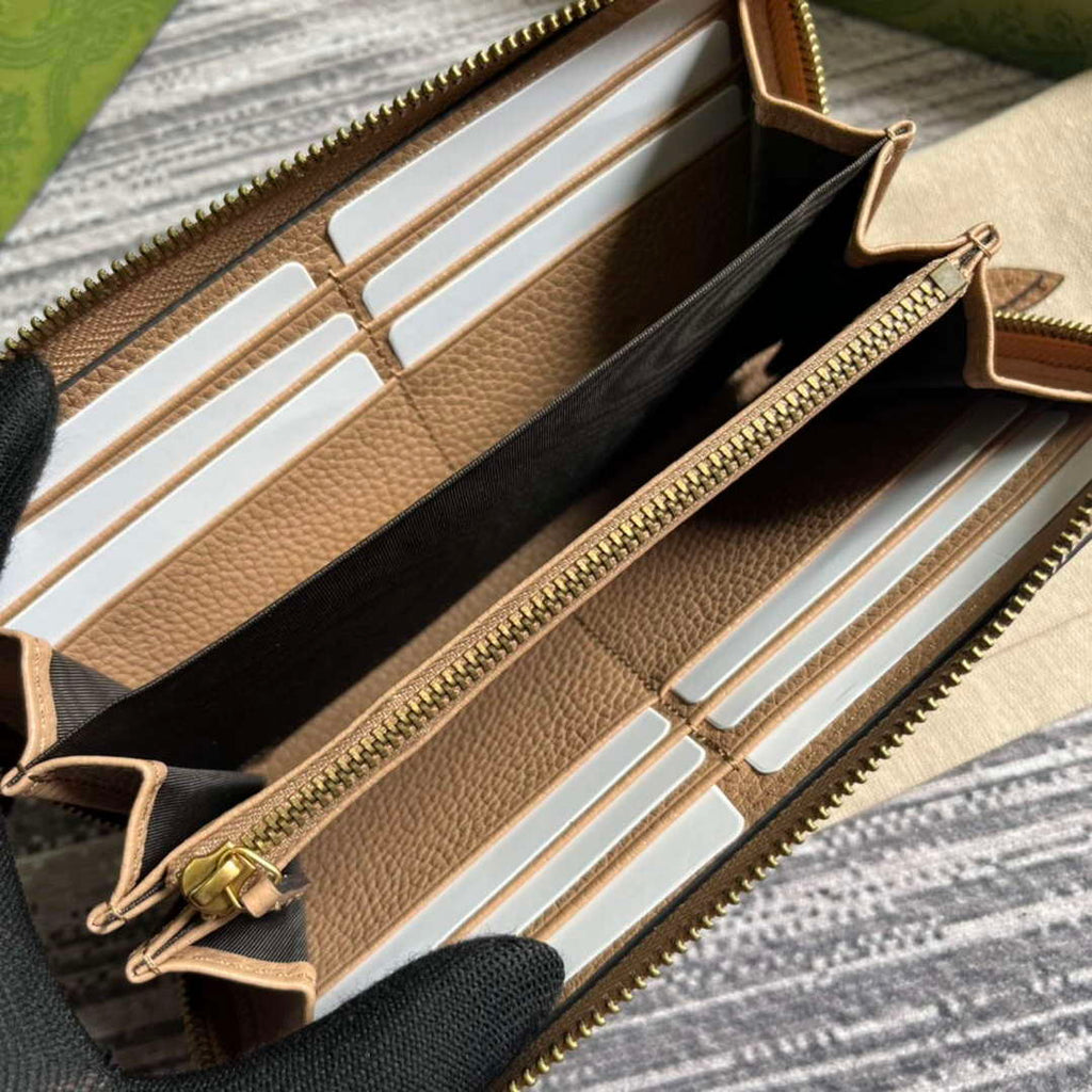 Gucci 750458 Zip wallet with Interlocking G python bow Rose beige