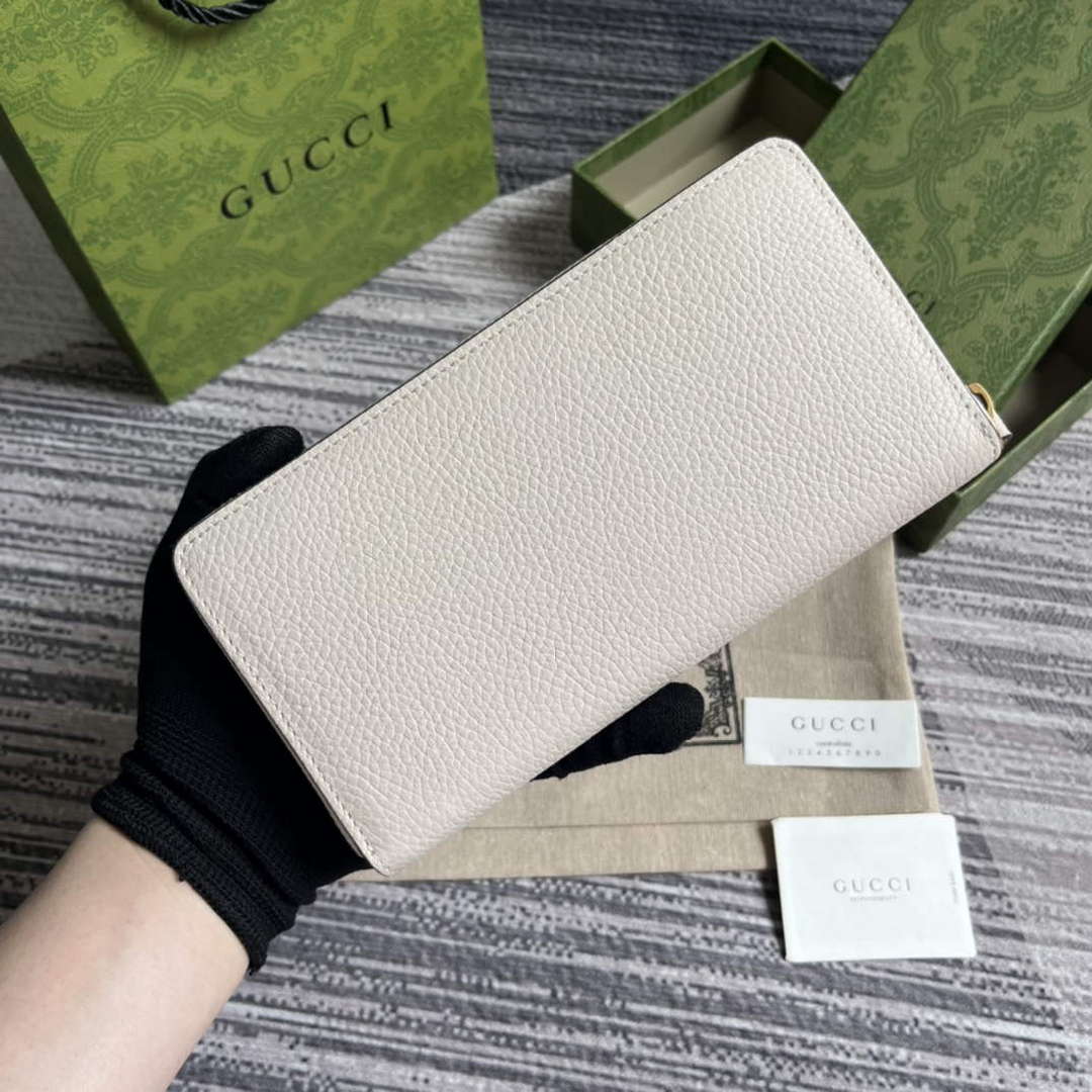 Gucci 750458 Zip wallet with Interlocking G python bow White