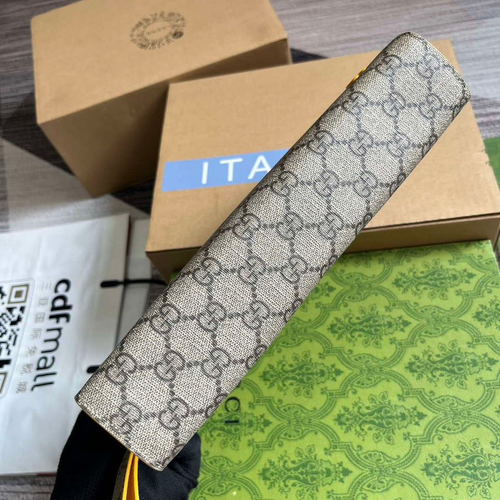 Gucci 768255 GG pouch with GG detail Yellow