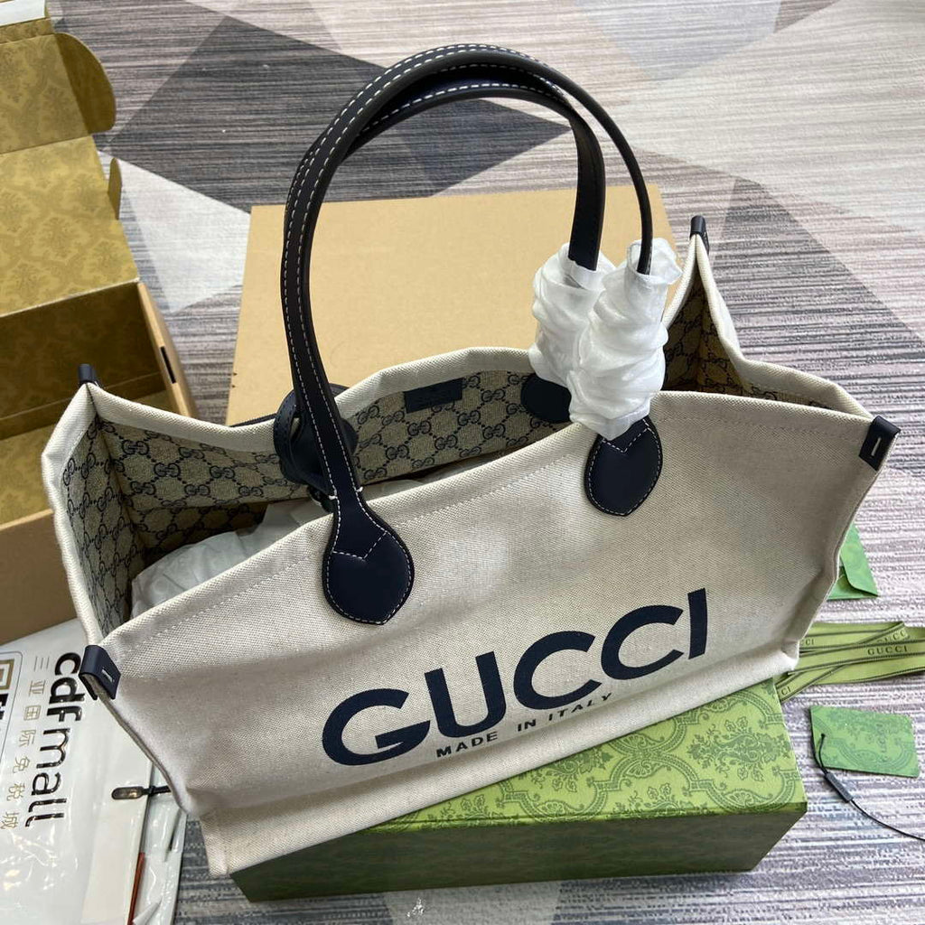 Gucci 772176 Medium Tote Bag With Gucci Print Black leather trim