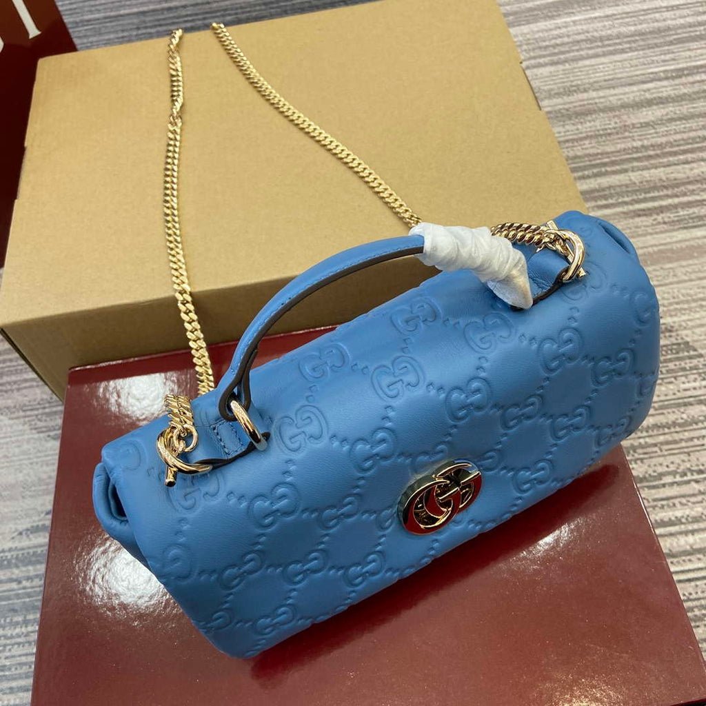 Gucci 806017 GG Milano Mini Top Handle Bag Blue GG puffy leather