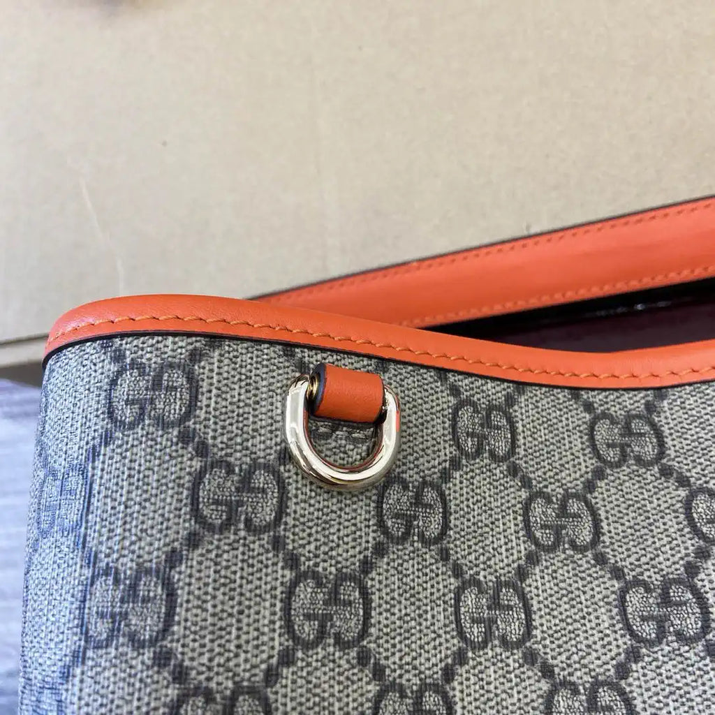 Gucci 815103 GG Emblem bucket bag Beige and Orange GG fabric