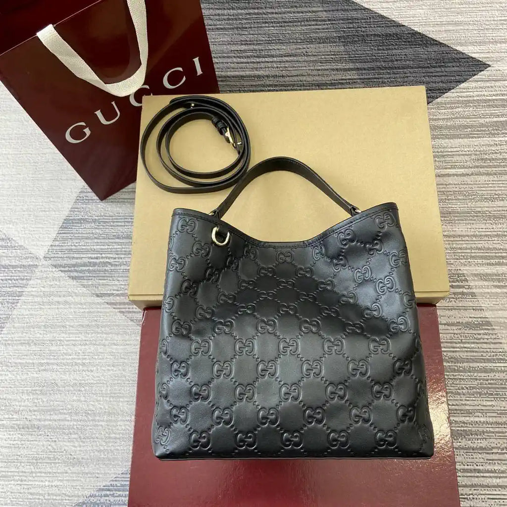 Gucci 815103 GG Emblem bucket bag Black Leather