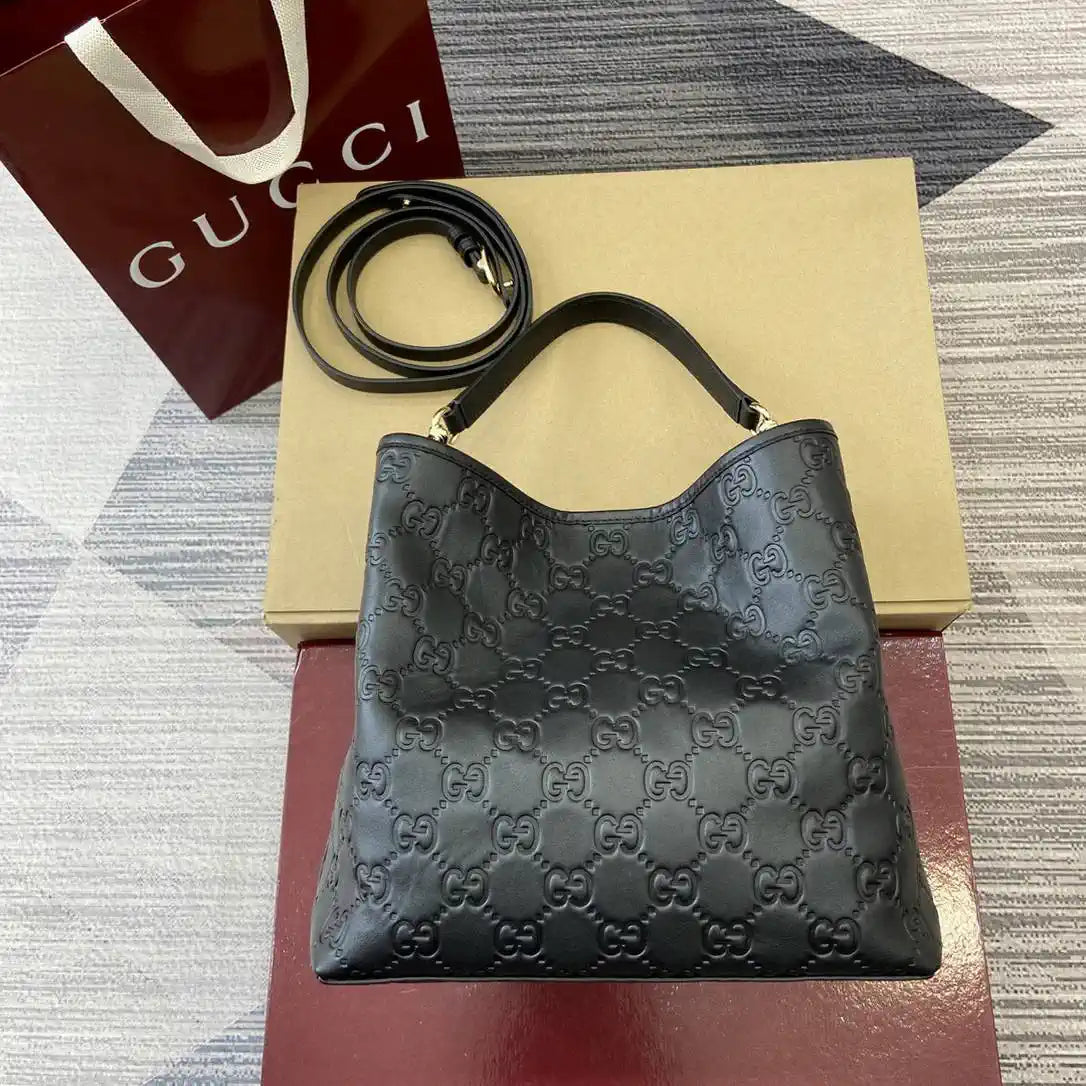 Gucci 815103 GG Emblem bucket bag Black Leather