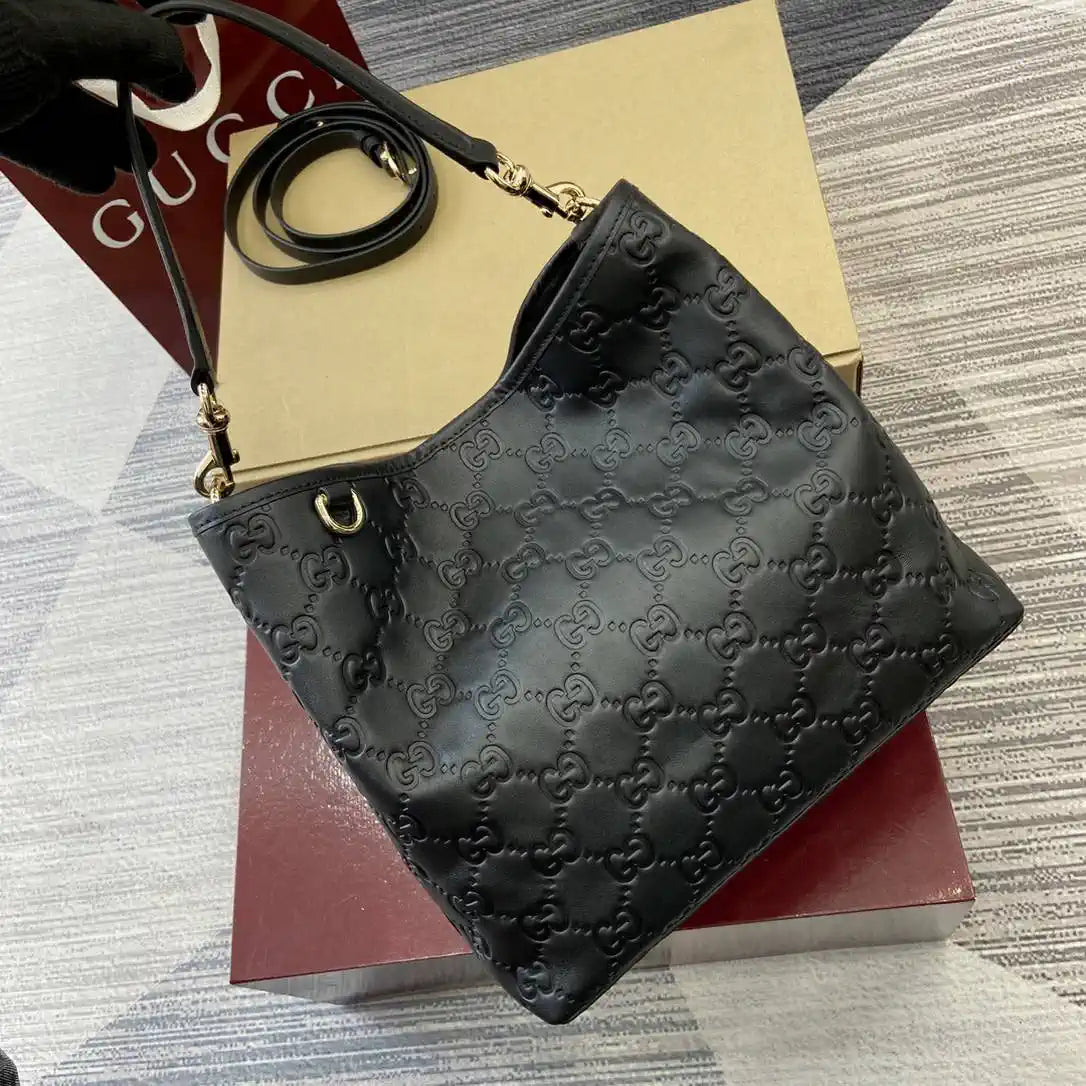 Gucci 815103 GG Emblem bucket bag Black Leather