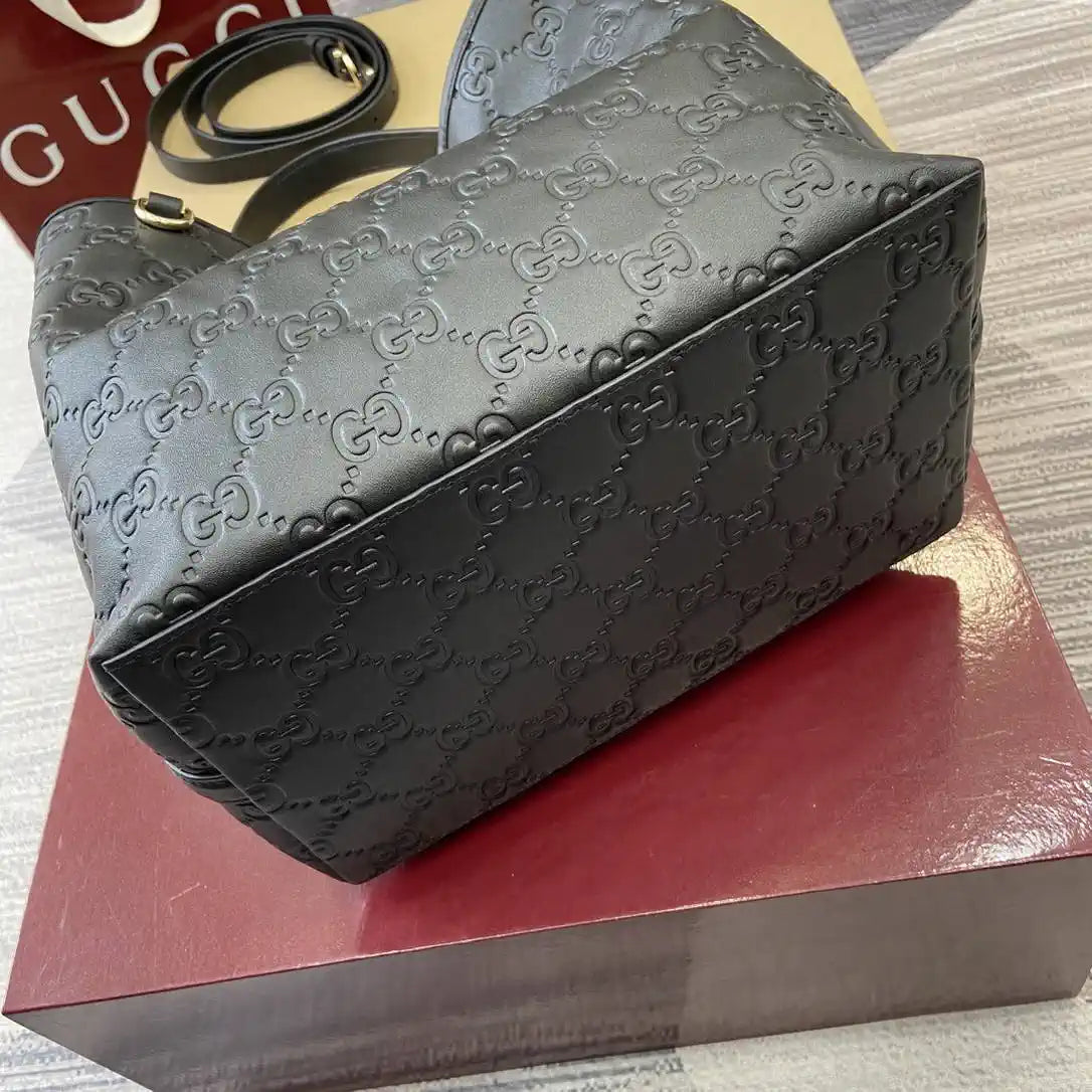 Gucci 815103 GG Emblem bucket bag Black Leather