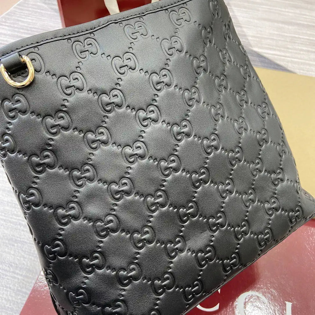 Gucci 815103 GG Emblem bucket bag Black Leather