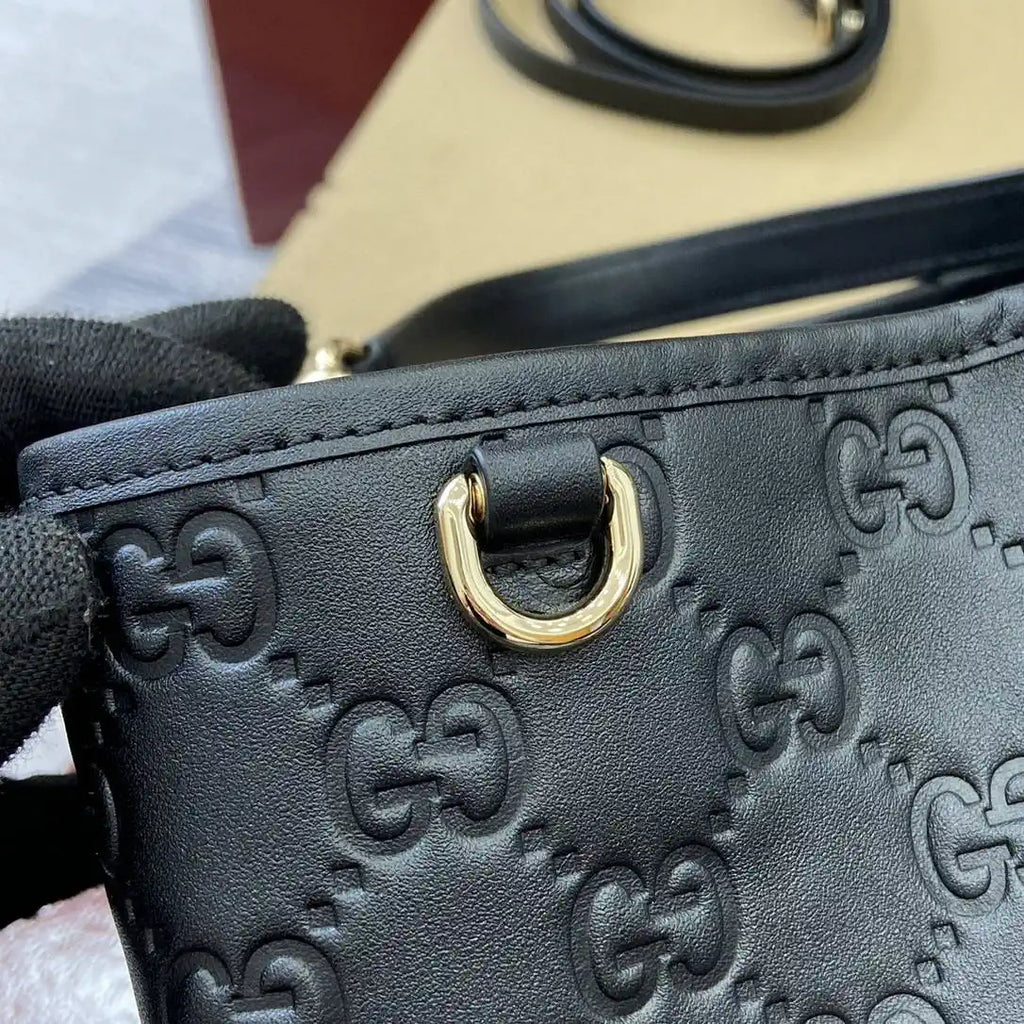 Gucci 815103 GG Emblem bucket bag Black Leather