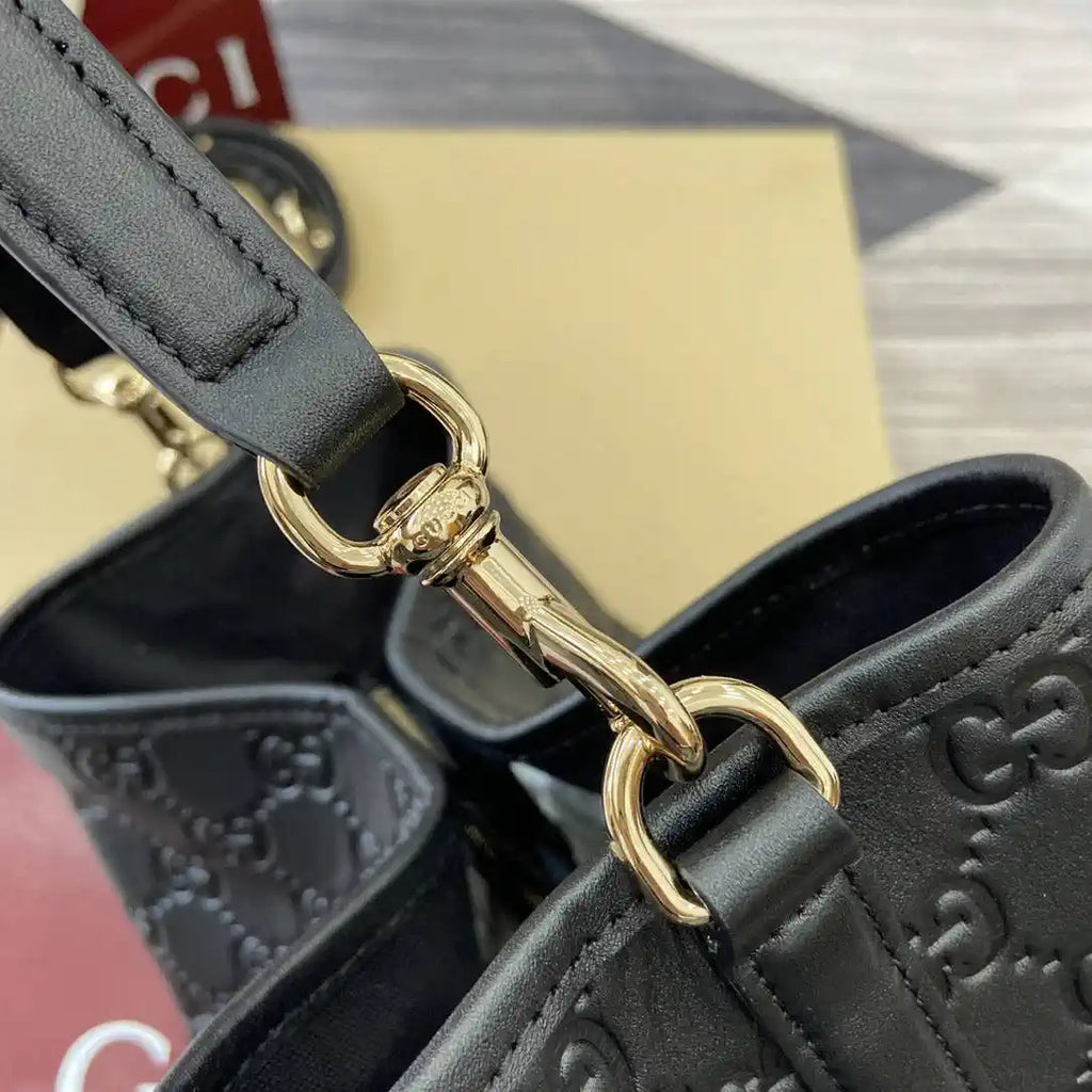 Gucci 815103 GG Emblem bucket bag Black Leather