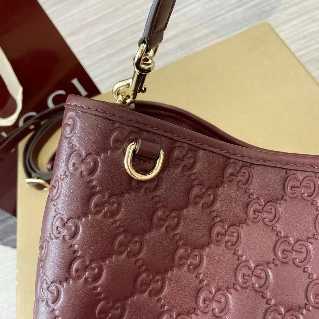 Gucci 815103 GG Emblem bucket bag Red Leather
