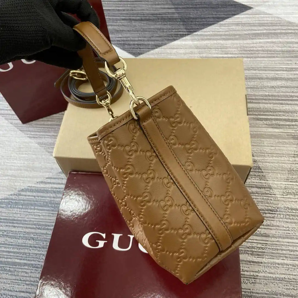 Gucci 815118 GG Emblem Mini Bucket Bag brown GG leather