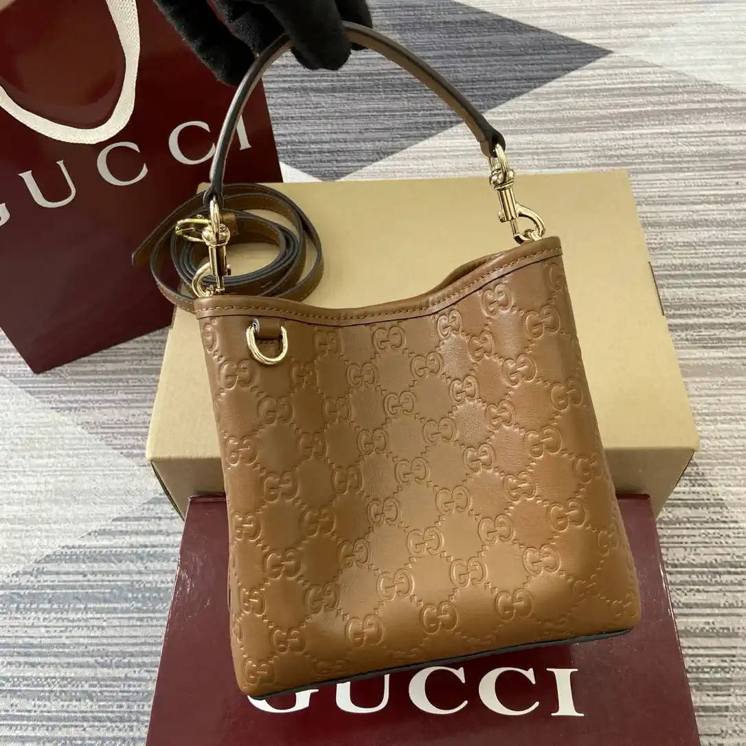 Gucci 815118 GG Emblem Mini Bucket Bag brown GG leather