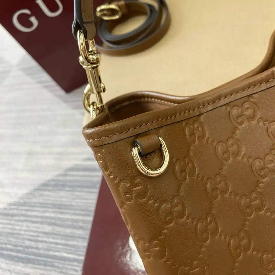 Gucci 815118 GG Emblem Mini Bucket Bag brown GG leather