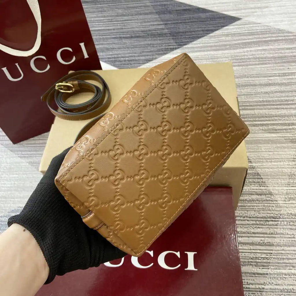 Gucci 815118 GG Emblem Mini Bucket Bag brown GG leather