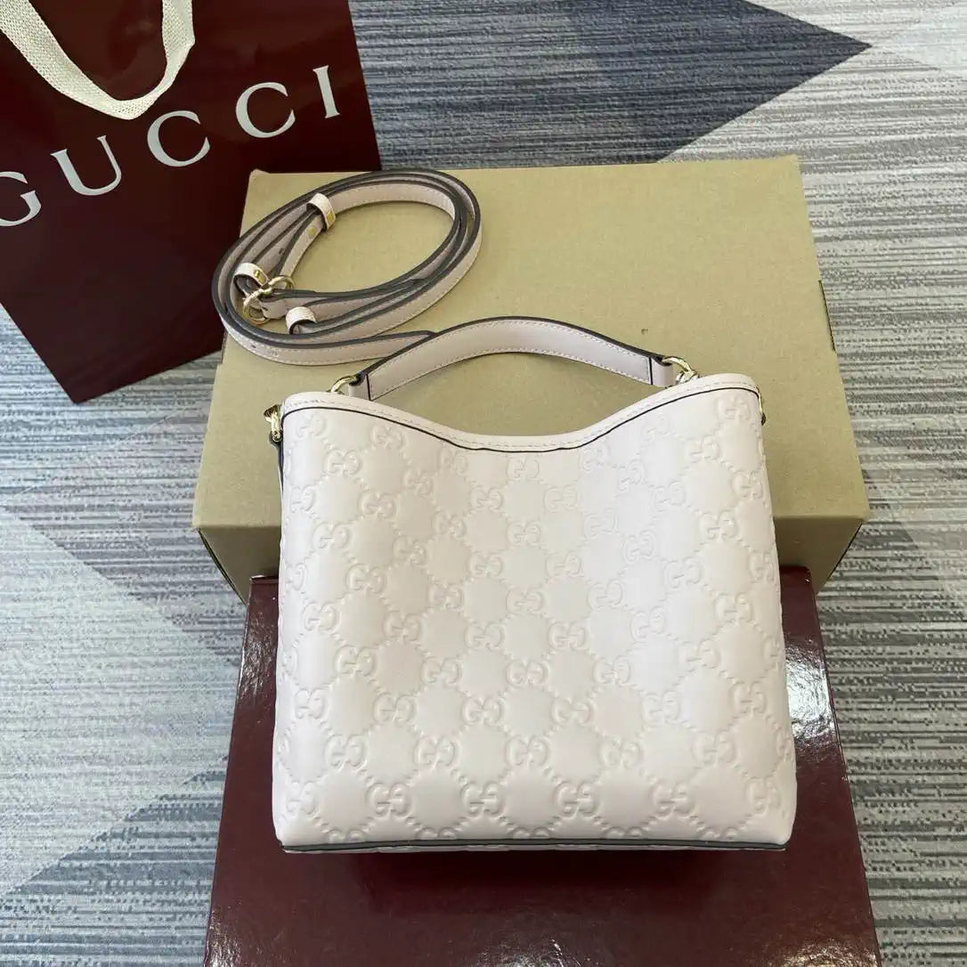 Gucci 815118 GG Emblem small bucket bag Light Pink GG leather