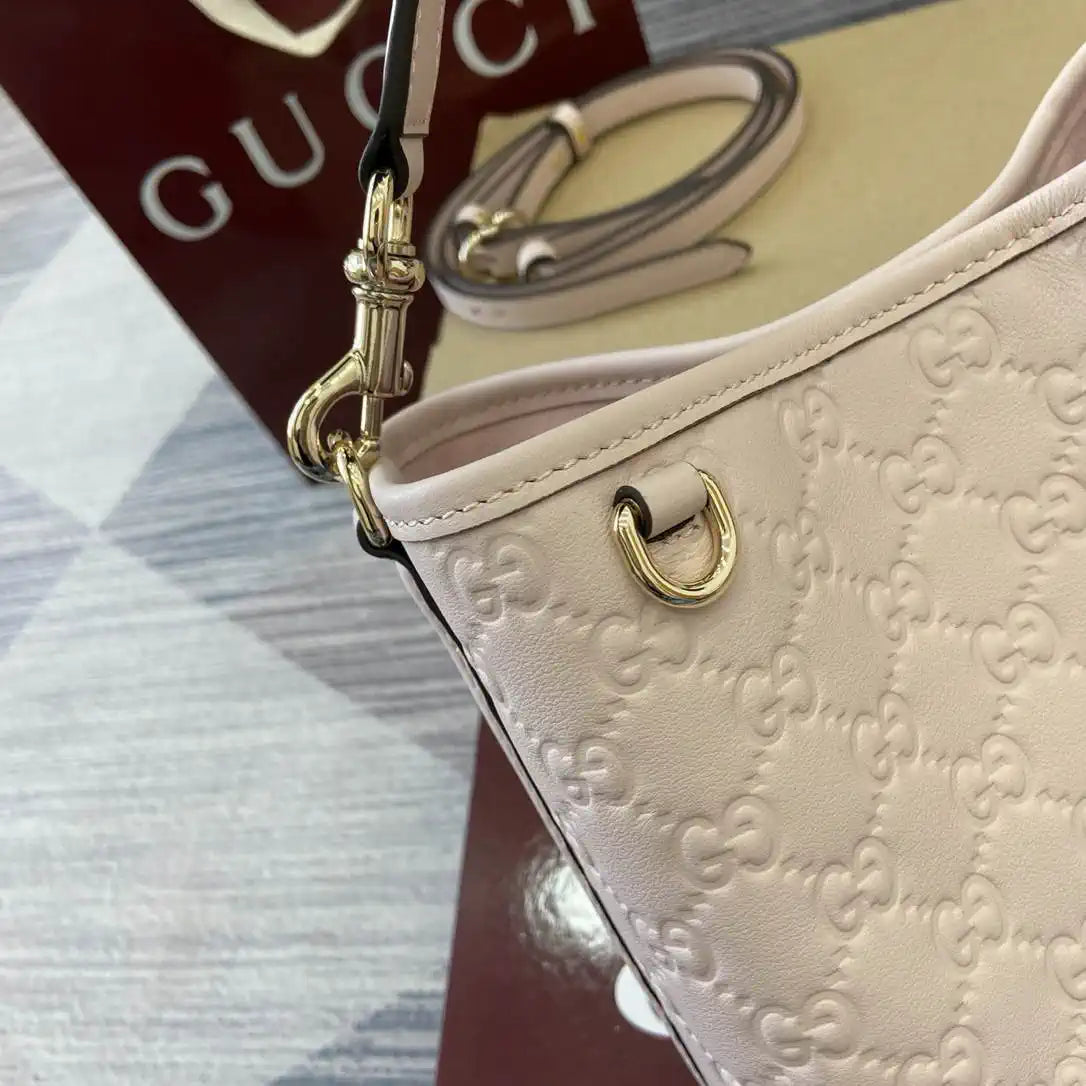 Gucci 815118 GG Emblem small bucket bag Light Pink GG leather