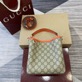 Gucci 815118 GG Emblem small bucket bag beige and orange fabric