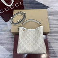 Gucci 815118 GG Emblem small bucket bag beige and white fabric