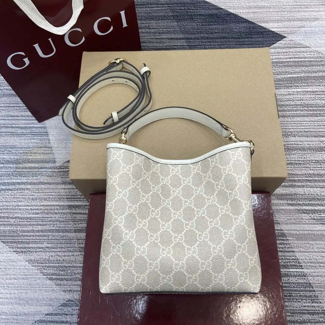 Gucci 815118 GG Emblem small bucket bag beige and white fabric