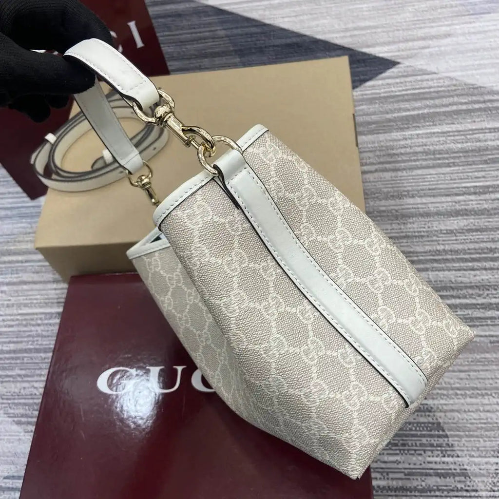 Gucci 815118 GG Emblem small bucket bag beige and white fabric