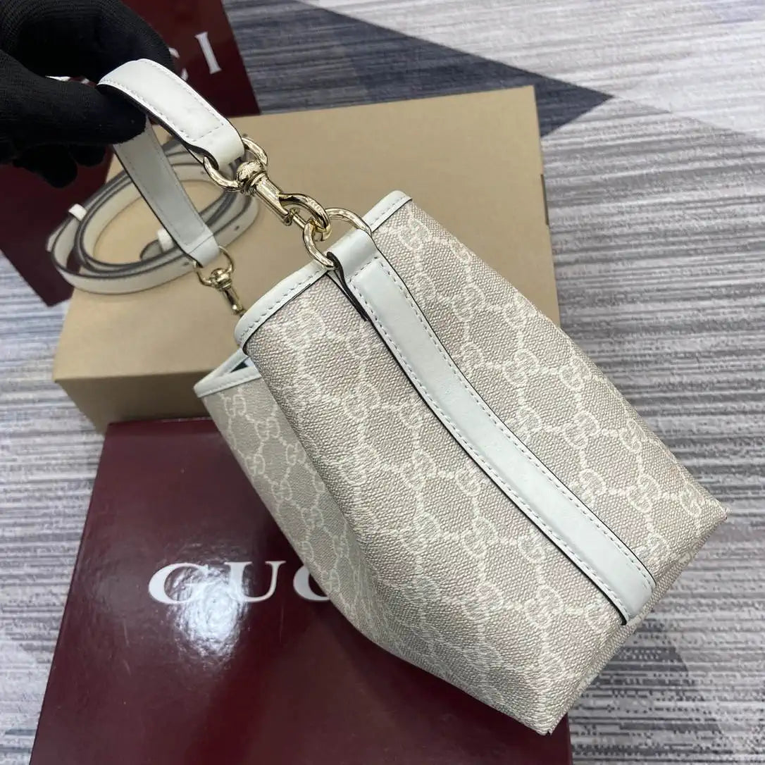 Gucci 815118 GG Emblem small bucket bag beige and white fabric