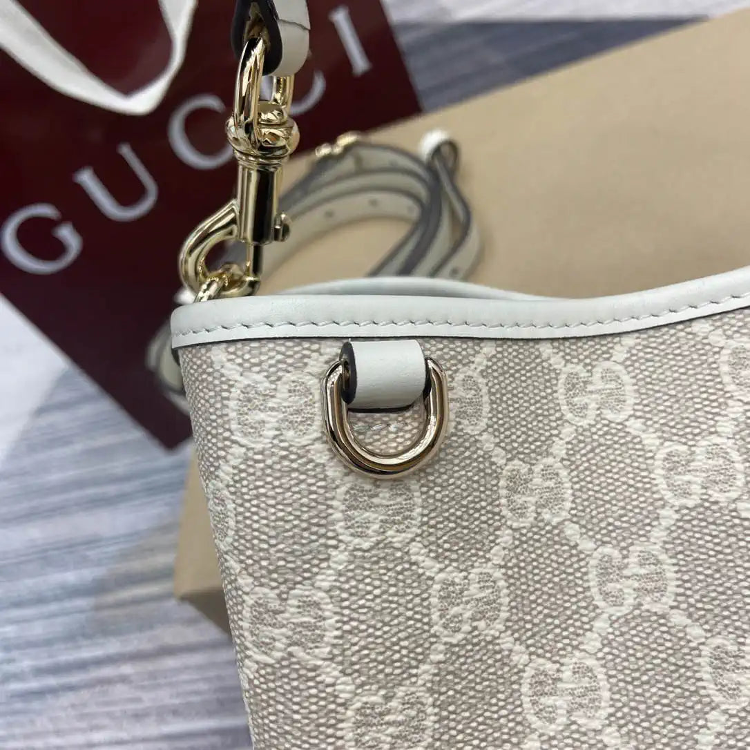 Gucci 815118 GG Emblem small bucket bag beige and white fabric