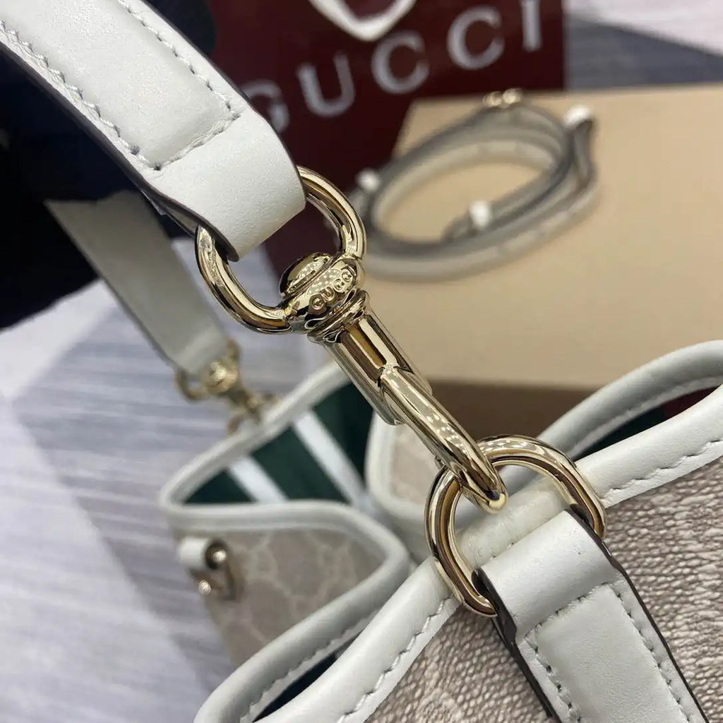 Gucci 815118 GG Emblem small bucket bag beige and white fabric