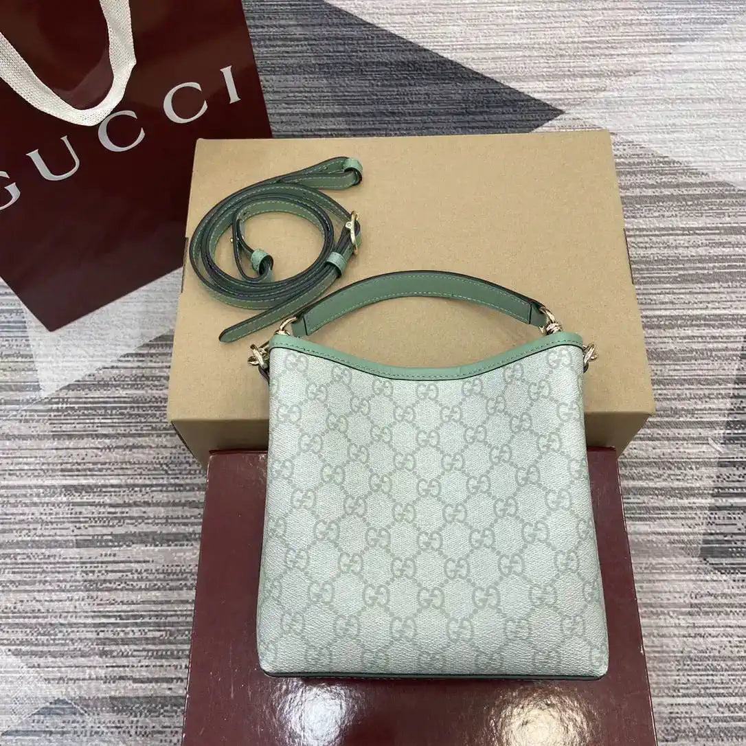 Gucci 815118 GG Emblem small bucket bag Green fabric