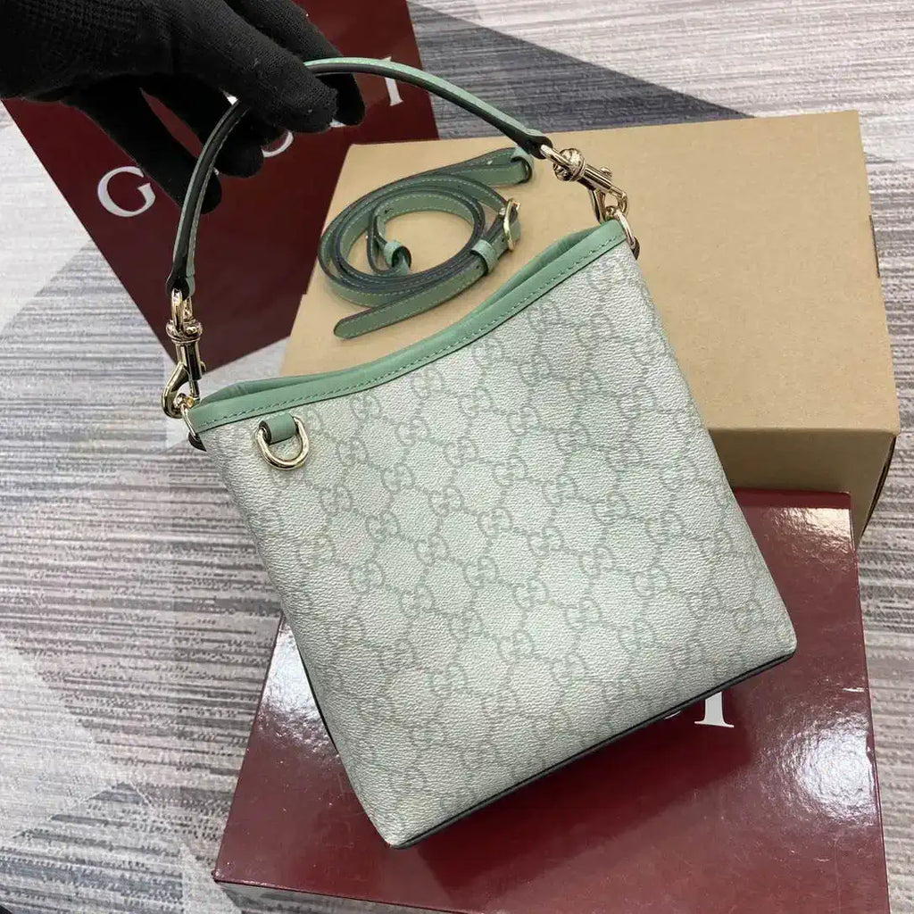 Gucci 815118 GG Emblem small bucket bag Green fabric