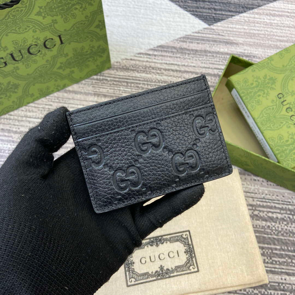 Gucci 815883 GG Emblem card case Black Leather