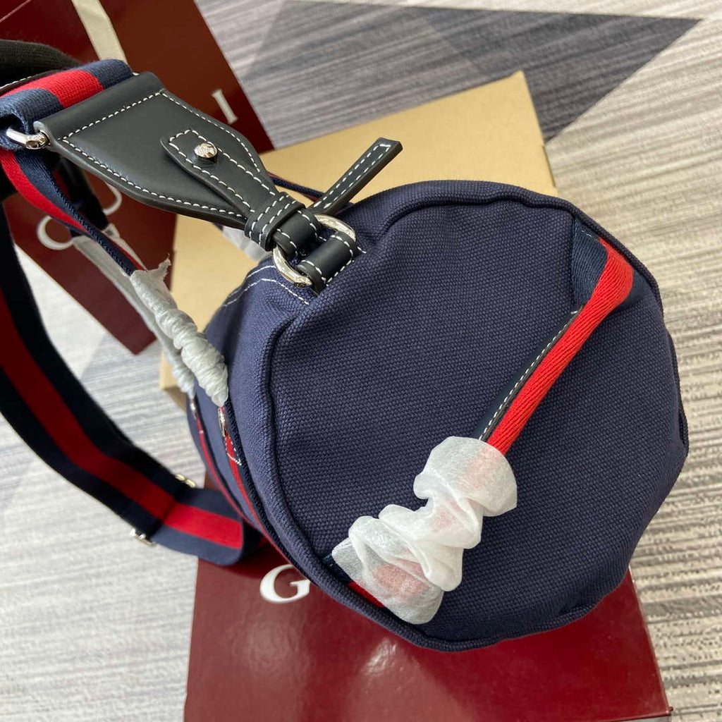 Gucci 816865 Small Printed Canvas Duffle Bag Dark blue