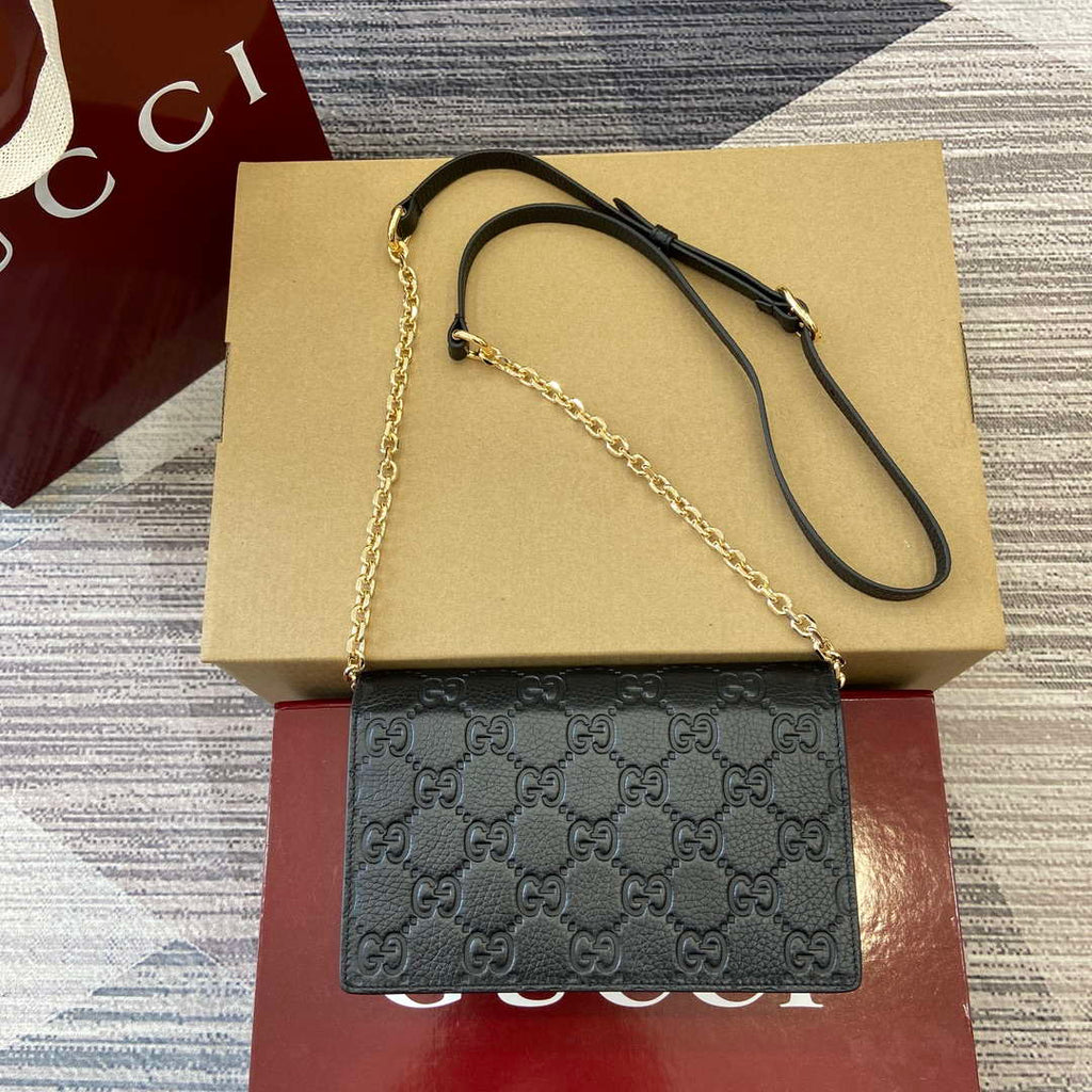 Gucci 818705 GG Emblem super mini shoulder bag Black