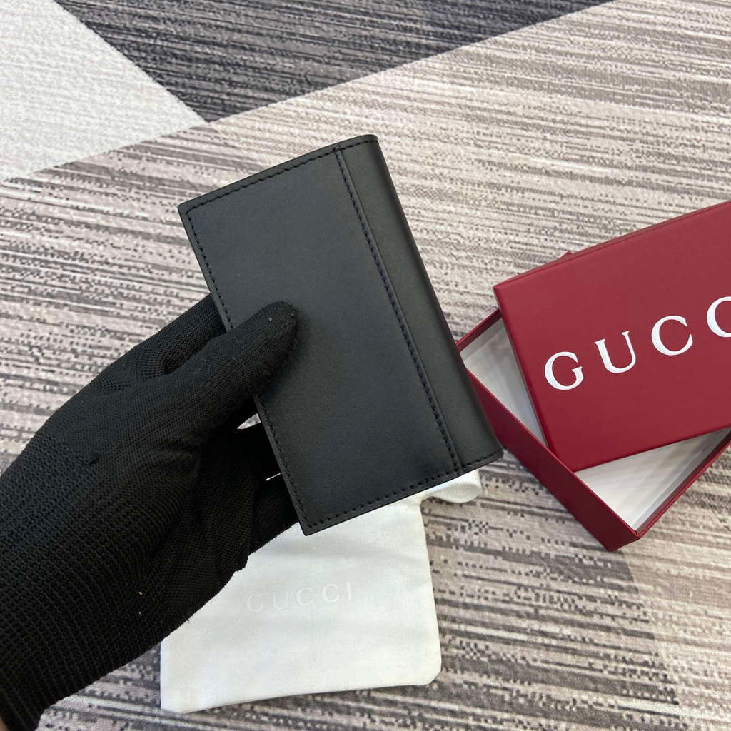 Gucci 818953 GG Emblem bi-fold embossed card case Black