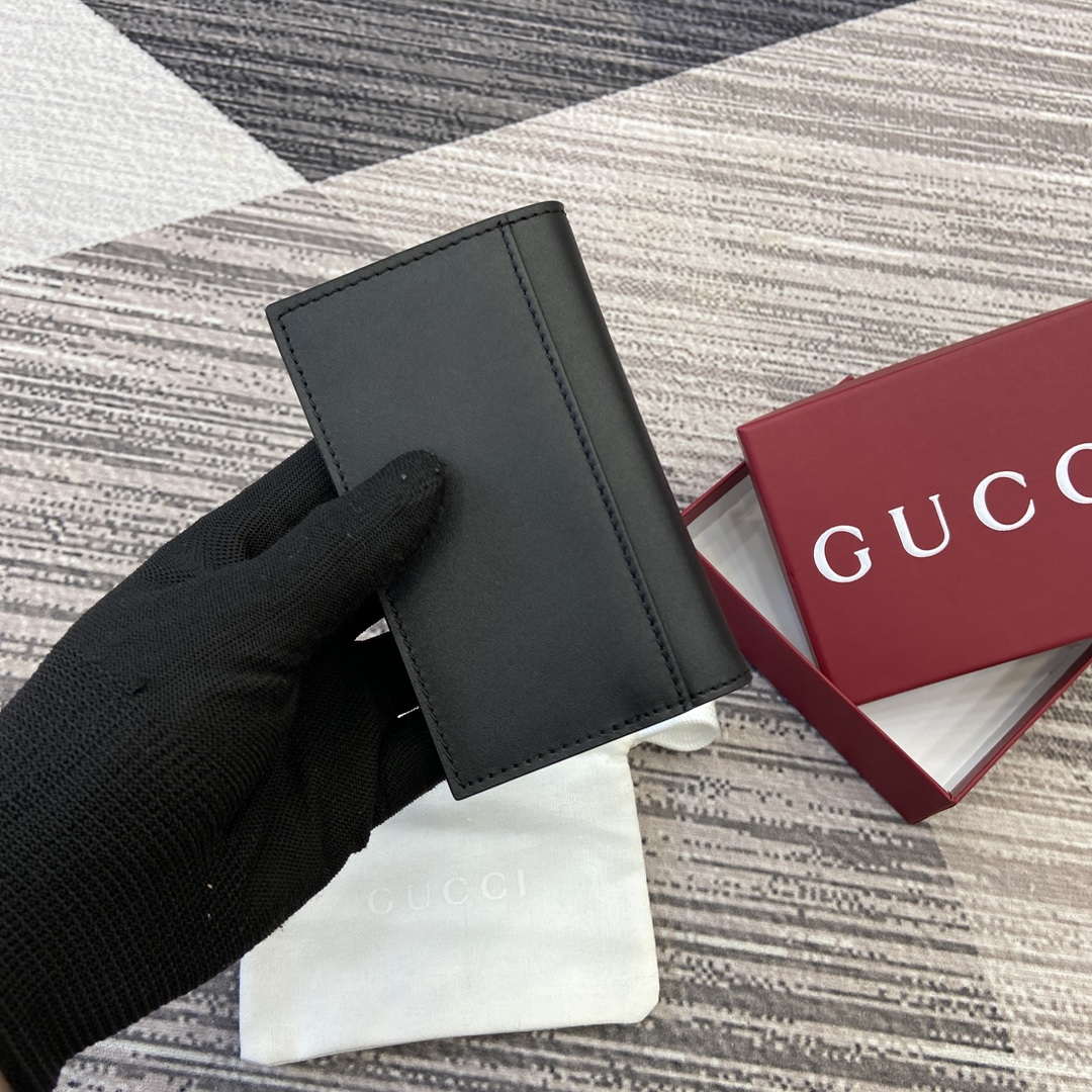 Gucci 818953 GG Emblem bi-fold embossed card case Black