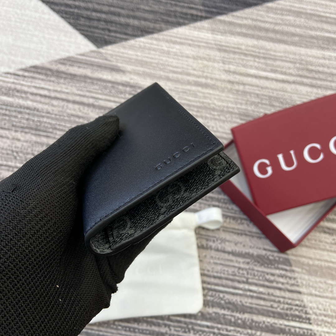 Gucci 818953 GG Emblem bi-fold embossed card case Black