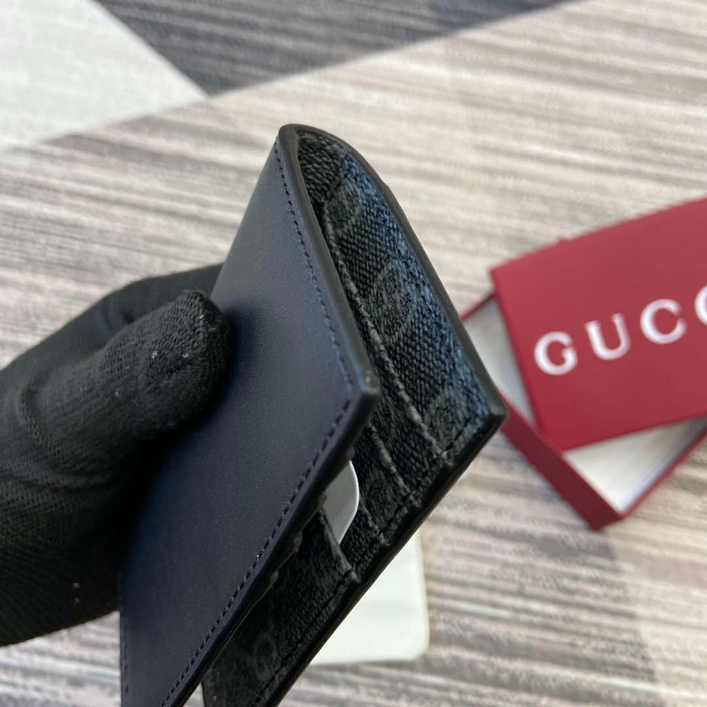 Gucci 818953 GG Emblem bi-fold embossed card case Black