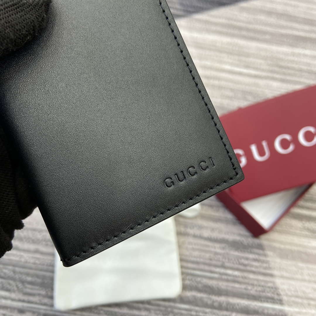 Gucci 818953 GG Emblem bi-fold embossed card case Black