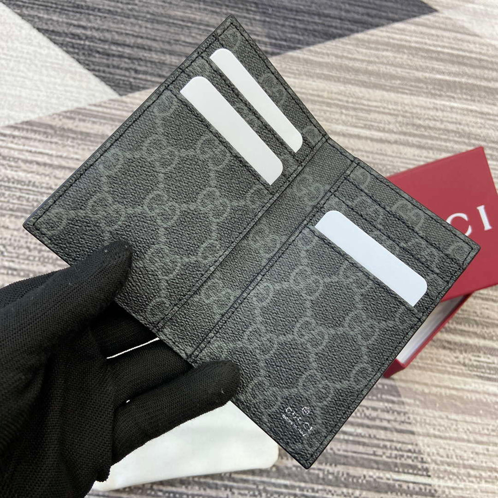 Gucci 818953 GG Emblem bi-fold embossed card case Black