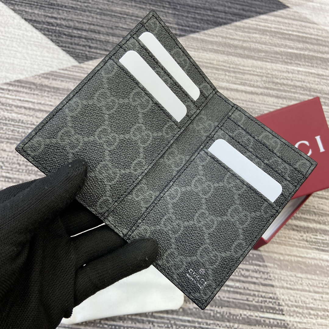 Gucci 818953 GG Emblem bi-fold embossed card case Black