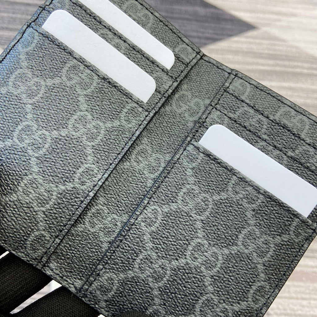 Gucci 818953 GG Emblem bi-fold embossed card case Black