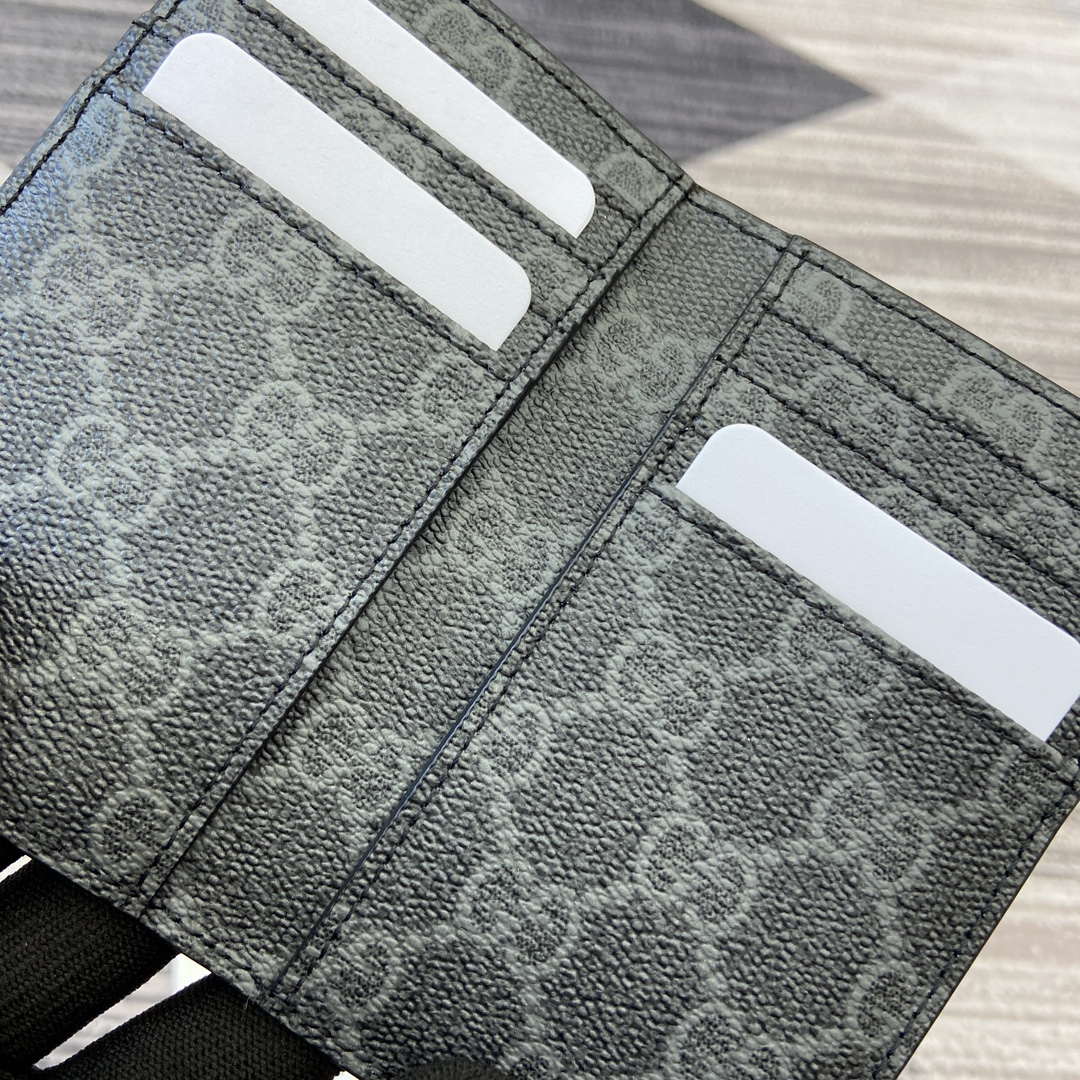 Gucci 818953 GG Emblem bi-fold embossed card case Black