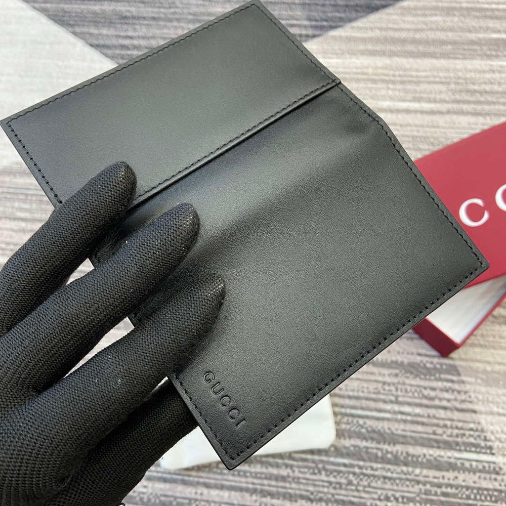 Gucci 818953 GG Emblem bi-fold embossed card case Black