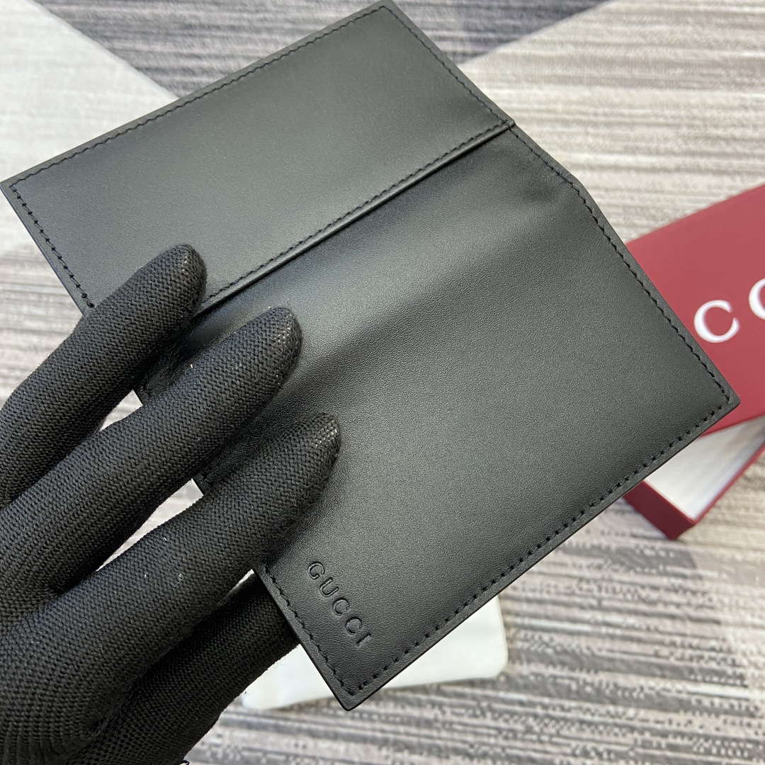 Gucci 818953 GG Emblem bi-fold embossed card case Black