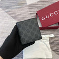 Gucci 821206 GG Emblem bi-fold wallet Black