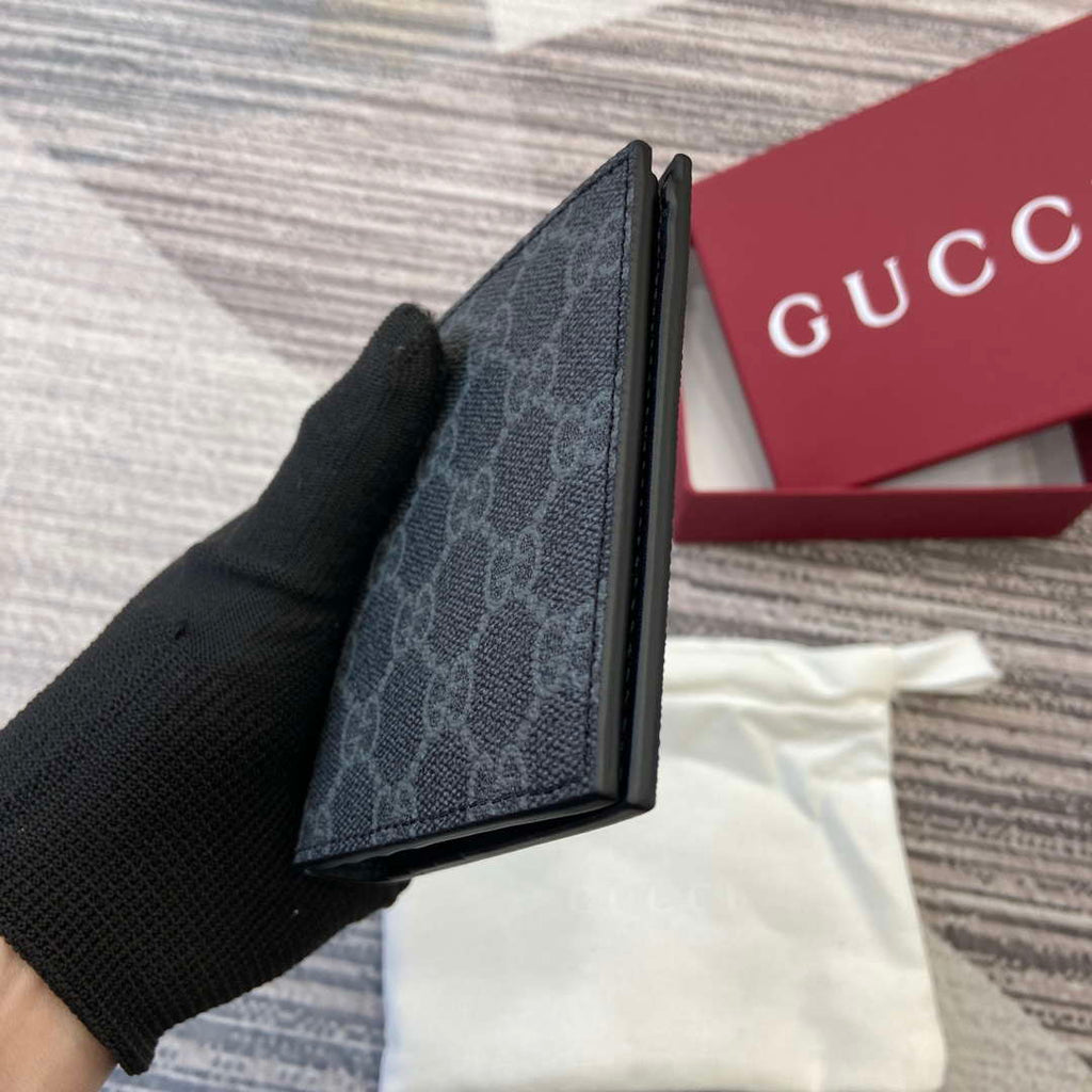 Gucci 821206 GG Emblem bi-fold wallet Black